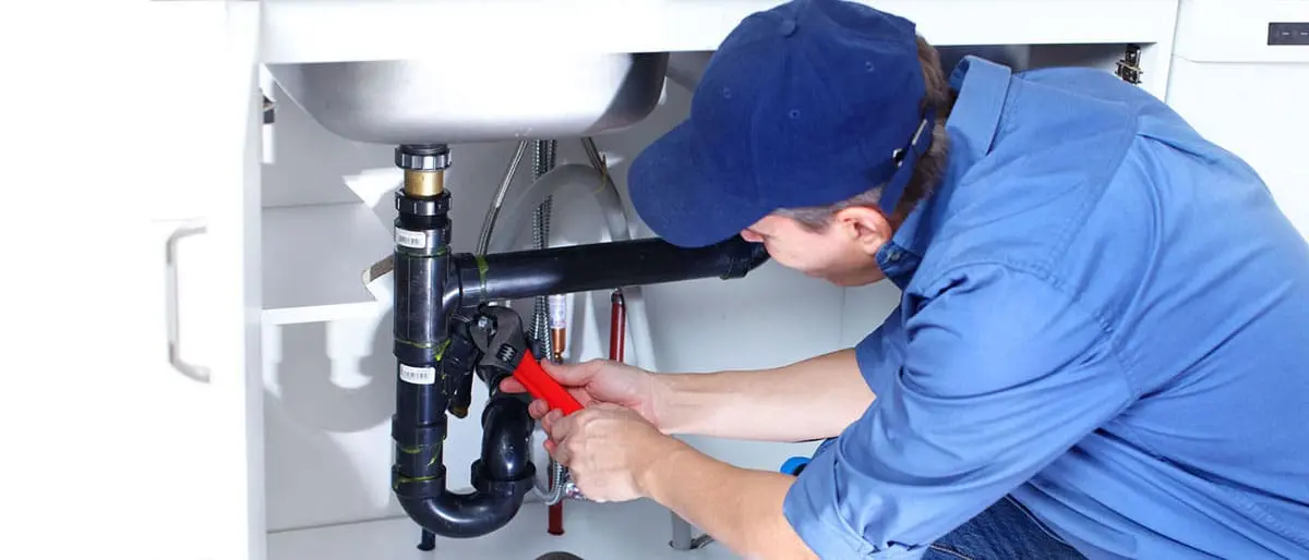 plumber under sink